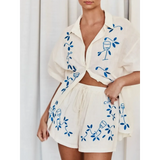 Trendsi embroidered shorts set for women in white with blue vine and wine glass design