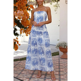 Blue and white and blue empire waist maxi dress with palm tree print and spaghetti straps