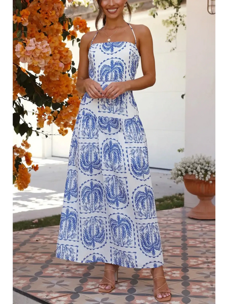 Blue and white and blue empire waist maxi dress with palm tree print and spaghetti straps