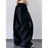 Babe Beachwear black extra wide leg flowing beach pants with elastic waist and side slit