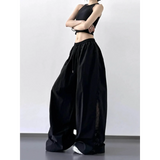 Babe Beachwear black extra wide leg flowing beach pants with drawstring waist worn with black crop top