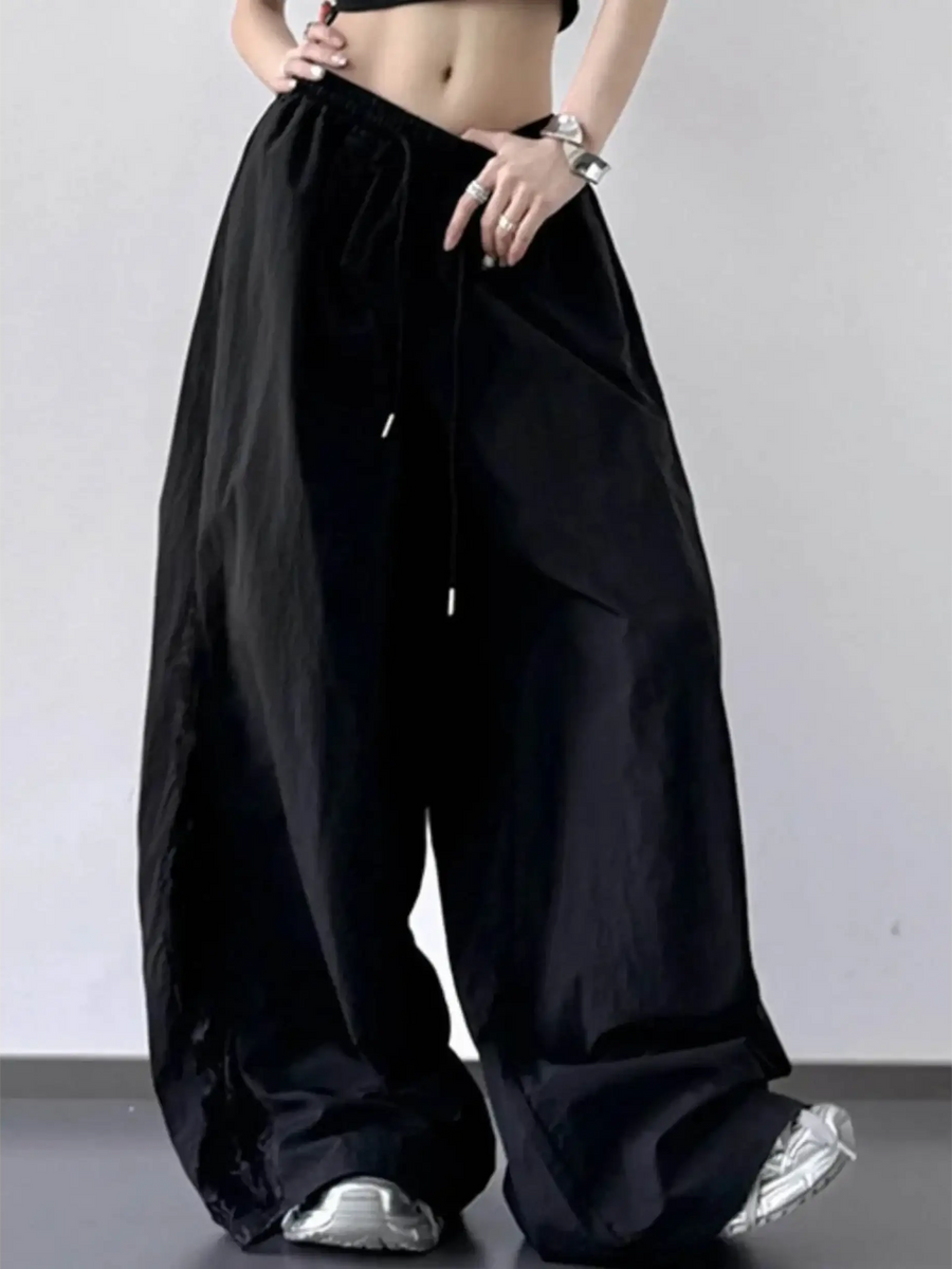 Babe Beachwear black extra wide leg flowing beach pants with drawstring waist and relaxed fit
