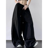 Babe Beachwear black extra wide leg flowing beach pants with drawstring waist and relaxed fit