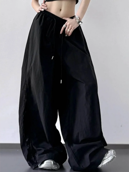 Babe Beachwear black extra wide leg flowing beach pants with drawstring waist and relaxed fit