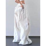 Babe Beachwear white extra wide leg flowing beach pants with side pockets and airy fabric