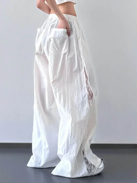 Babe Beachwear white extra wide leg flowing beach pants with side pockets and airy fabric