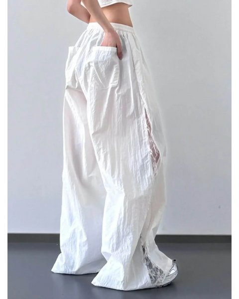 Babe Beachwear white extra wide leg flowing beach pants with side pockets and airy fabric