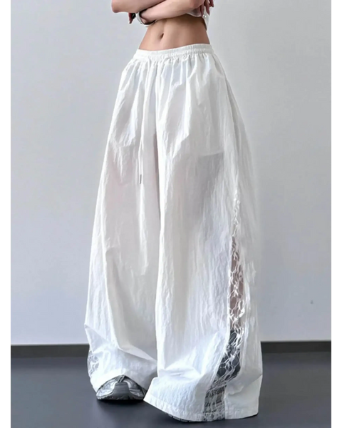 Babe Beachwaer white extra wide leg flowing beach pants with side mesh details and elastic waistband