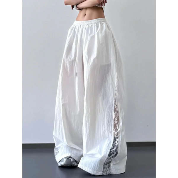 Babe Beachwaer white extra wide leg flowing beach pants with side mesh details and elastic waistband