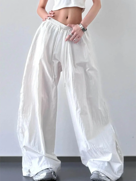 Babe Beachwear white extra wide leg flowing beach pants with elastic waistband and relaxed fit