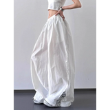 Babe Beachwear extra wide leg flowing beach pants in white worn with a cropped top