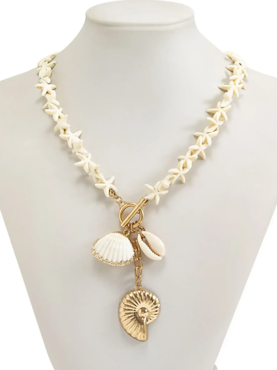 Trendsi Fashionable Shell Resort Necklace featuring white star-shaped beads and gold shell charms