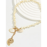 Fashionable Shell Resort Necklace with cream shell beads and gold tone shell charms by Trendsi