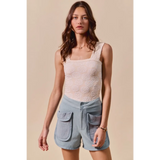 Trendsi High Rise Cargo Shorts in light blue with large front pockets worn by a female model