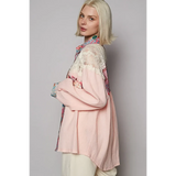 Babe Beachwear lace patchwork long sleeve shirt in pink with floral and lace details worn by a blonde model