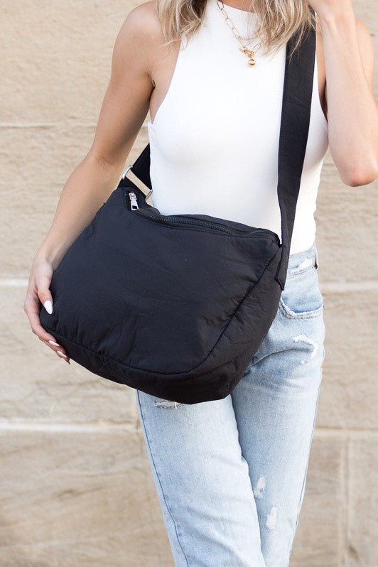 Babe Beachwear Large Nylon Messenger Bag in black worn crossbody with adjustable strap