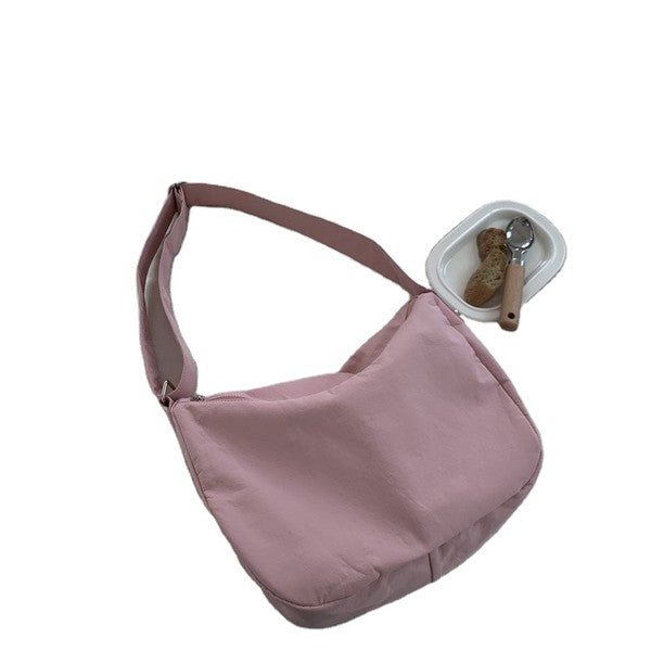 Large Nylon Messenger Bag in soft pink from Babe Beachwear with adjustable shoulder strap