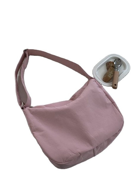 Large Nylon Messenger Bag in soft pink from Babe Beachwear with adjustable shoulder strap
