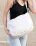 White Large Nylon Messenger Bag by Babe Beachwear worn by a woman with black tank top and jeans