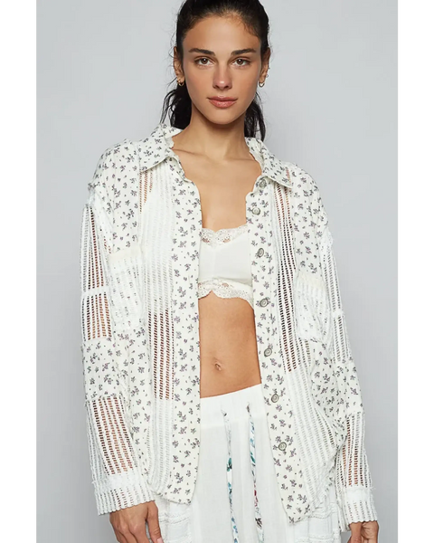Lightweight Crochet Long white floral crochet top by Trendsi worn by model with matching white outfit