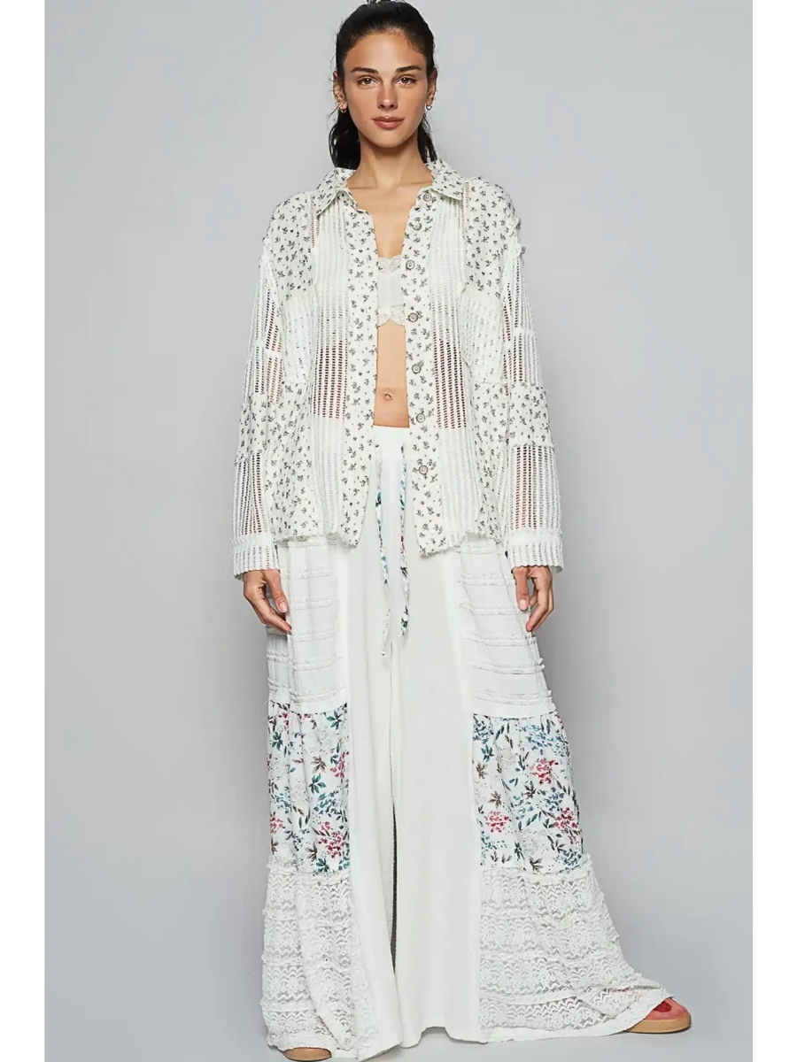 Trendsi lightweight crochet long white top with intricate open knit and floral detail worn by model