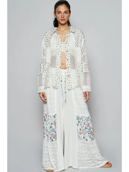 Trendsi lightweight crochet long white top with intricate open knit and floral detail worn by model