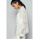 Trendsi lightweight crochet long sleeve white crochet top with floral details worn by woman