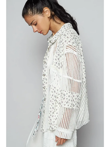 Trendsi lightweight crochet long sleeve white crochet top with floral details worn by woman