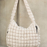 Lightweight Large Quilted Puffer Shoulder Bag in beige with padded strap and zipper details