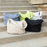 Lightweight Large Quilted Puffer Shoulder Bag in multiple colors from Babe Beachwear displayed on steps