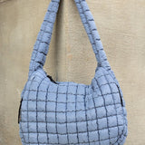 Lightweight Large Quilted Puffer Shoulder Bag in soft blue with padded strap and zipper closure