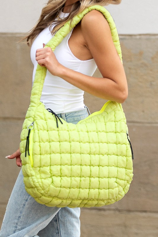 Babe Beachwear Lightweight Large Quilted Puffer Shoulder Bag in bright yellow worn by model