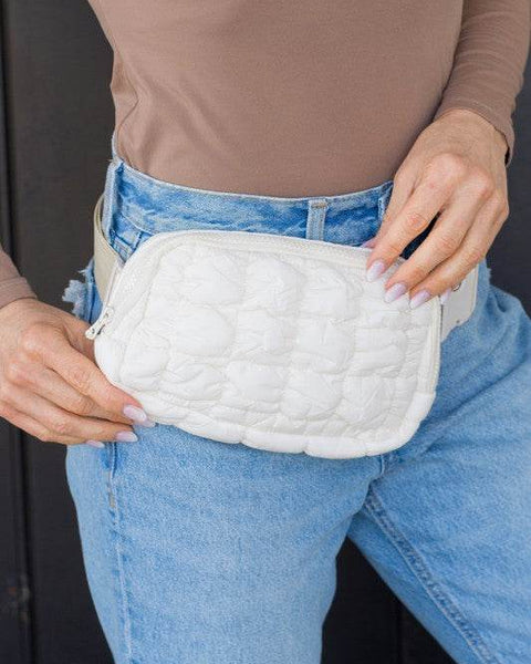 Babe Beachwaer Lightweight Puffer Sling Bag in white worn with casual outfit