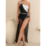 Trendsi long torso one shoulder swimsuit in black and white with floral accents and sheer skirt overlay