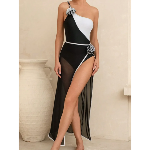 Trendsi long torso one shoulder swimsuit in black and white with floral accents and sheer skirt overlay
