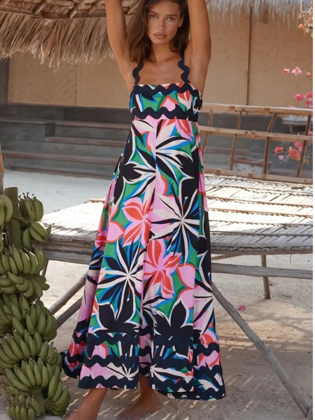 Trendsi maxi dress featuring a colorful floral pattern on a navy blue resort dress perfect for beach vacations