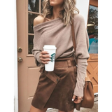 Babe Beachwear one shoulder ribbed top for curvy women in beige worn with brown skirt and coffee cup