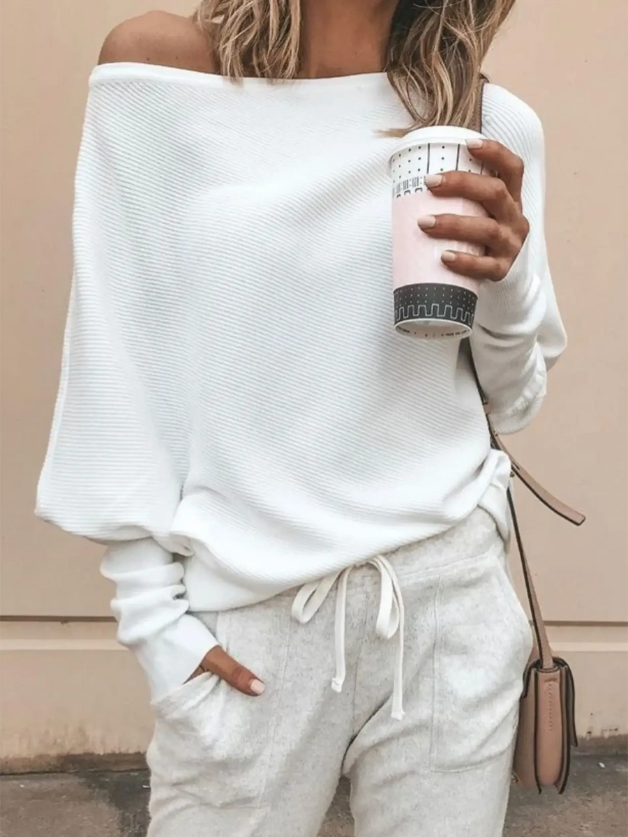 Babe Beachwear white long sleeve one shoulder ribbed top for curvy women styled with casual pants