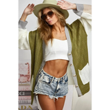 Trendsi oversized cardigan in green white and gray worn with denim shorts and white crop top