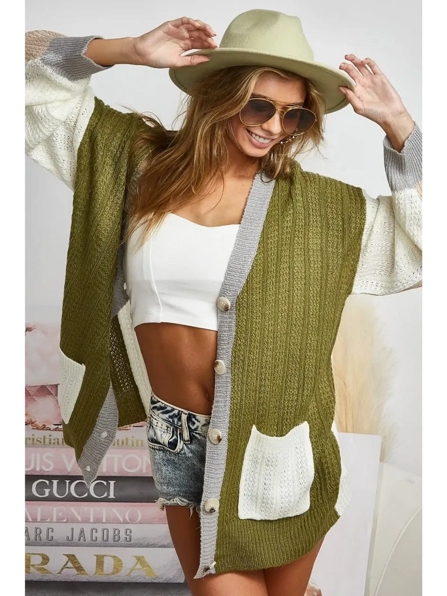 Trendsi oversized cardigan in olive green and white with button front and pockets worn with hat and sunglasses