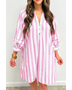 woman wearing a pink and white long sleeve vacation dress with vertical stripes and button detail