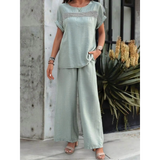 Light green satin pants set with short sleeves and wide legs from Babe Beachwear