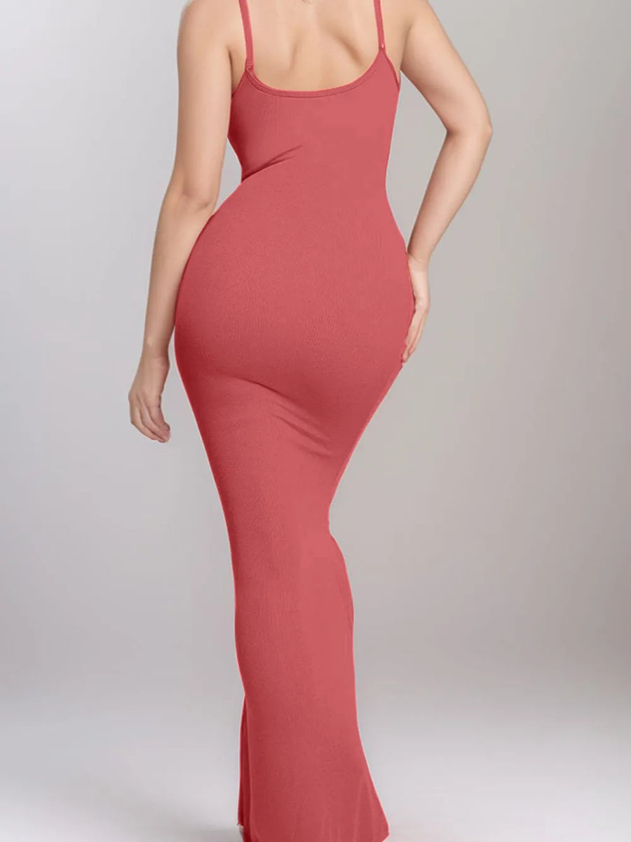 Back view of woman wearing a Trendsi shapewear maxi dress for women in pink with spaghetti straps