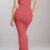 Back view of woman wearing a Trendsi shapewear maxi dress for women in pink with spaghetti straps