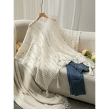 Trendsi long sleeve shawl lightweight knit in white draped over sofa with denim jeans