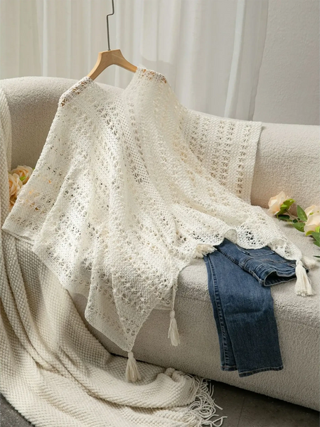 Trendsi long sleeve shawl lightweight knit in white draped over sofa with denim jeans