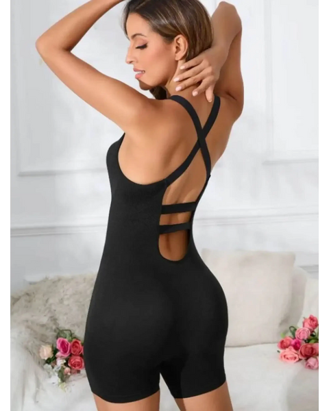 Black summer beach active romper for women by Trendsi with crisscross back straps and fitted design
