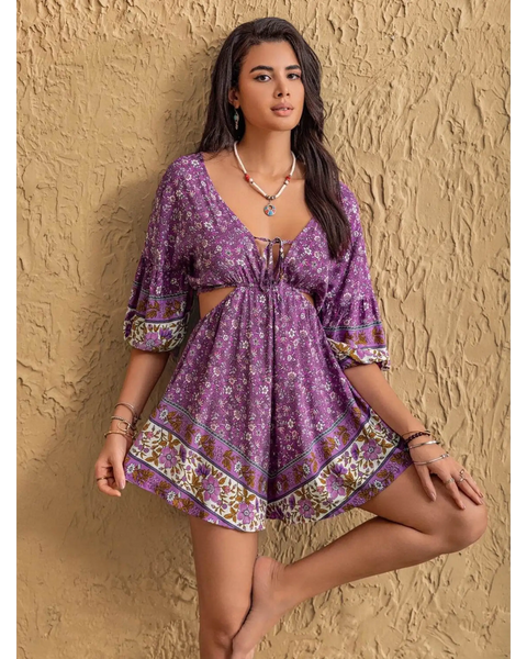 Babe Beachwear purple floral tied front cutout romper with 3 quarter sleeves and decorative border