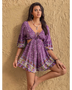 Babe Beachwear purple floral tied front cutout romper with 3 quarter sleeves and decorative border