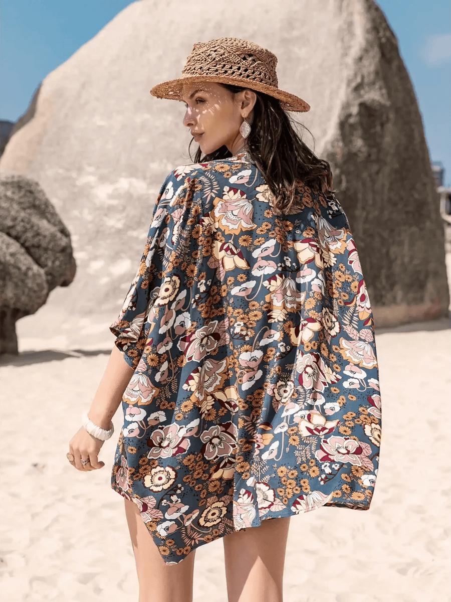 Trendsi floral short set worn by woman with woven hat on beach trendy vacation outfit women
